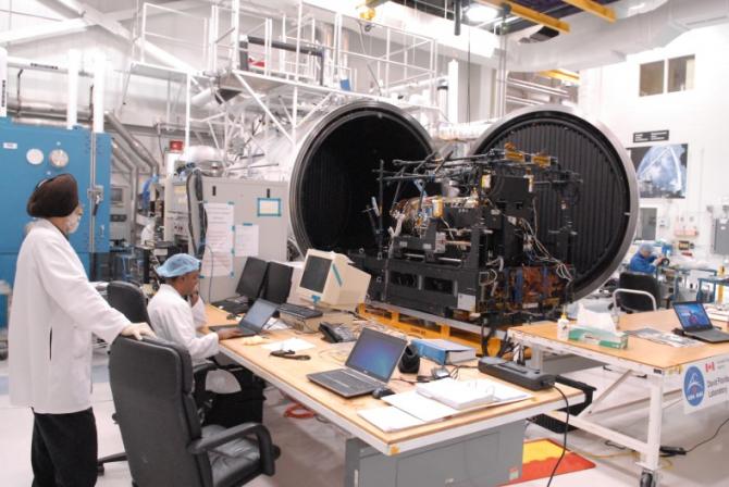 Researchers test a part of the Canadarm2 