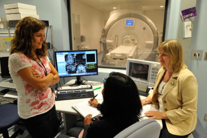 Researchers at work in the MRI facility